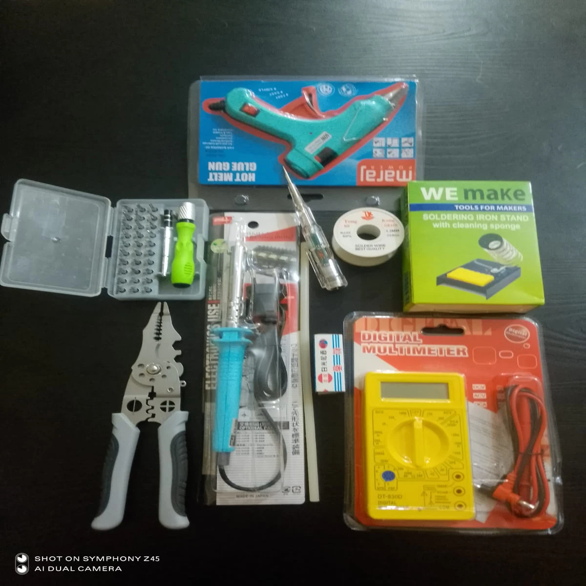 Combo Set : 10 in 1 = Cable Cutter Pliers, DIGITAL MULTIMETER, Soldering Iron, Soldering Iron Stand, Glue Gun, Glue, 32 in1 Screwdriver Set, Solid Rosin, Rang Wire, Ac/Dc Tester